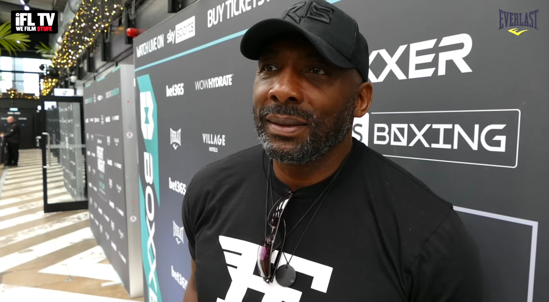 Mr Johnny Nelson wearing our signature black tee
